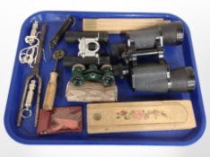 A group of binoculars, brass pastry cutter, pocket scale, whistle,
