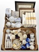 Two boxes containing Wedgwood Bradford Exchange collector's plates, stainless steel cutlery,