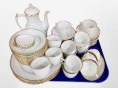 Approximately 55 pieces of Bing and Grøndahl white and gilt porcelain tea china.