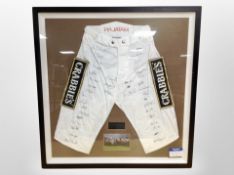 A framed pair of Crabbie's 2014 Grand National signed racing silks, 5th April Aintree Racecourse,