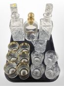 A Goldini gilt crystal decanter with six matching rummers,