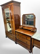 A late Victorian mahogany and satin wood three-piece bedroom suite : mirror door wardrobe,