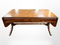 A reproduction mahogany and burr walnut coffee table,