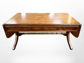 A reproduction mahogany and burr walnut coffee table,