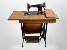 A Singer treadle sewing machine table
