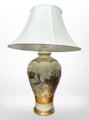 A large contemporary Oriental style ceramic table lamp with shade,