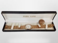 A Park Lane gold-plated quartz wristwatch.