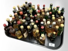 A large quantity of alcohol miniatures, scotch whiskey, etc.