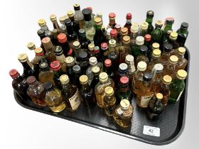 A large quantity of alcohol miniatures, scotch whiskey, etc.