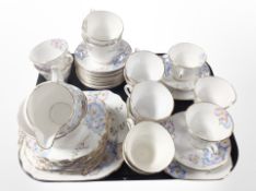 Approximately 41 pieces of T F & S Limited floral-decorated tea china.