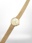 A lady's 9ct gold Eterna wristwatch with integral gold strap. CONDITION REPORT: 24.