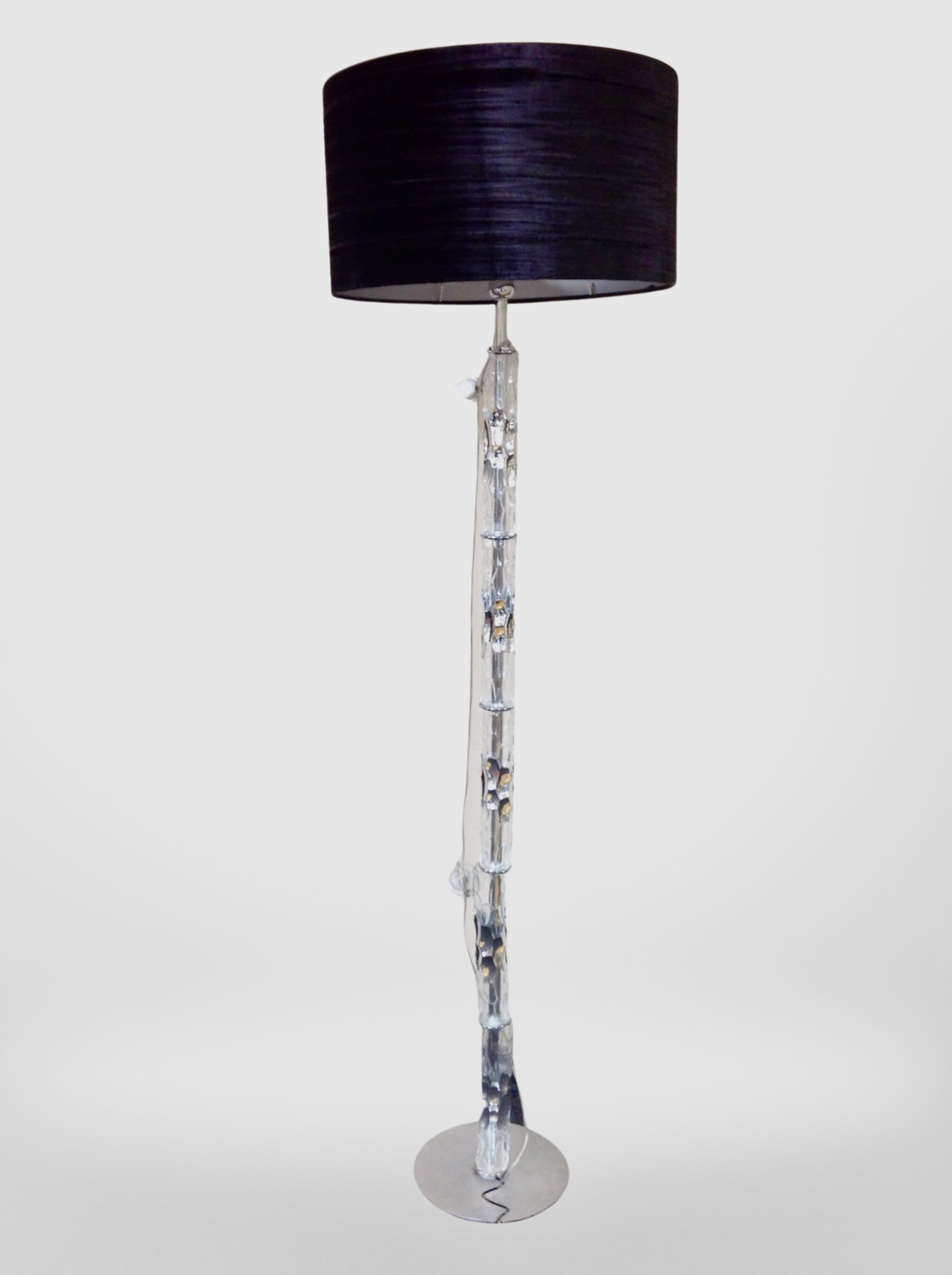 A contemporary standard lamp with shade, height 193cm.