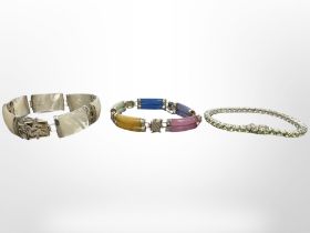 Three decorative silver bracelets