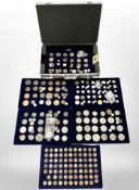 An aluminium coin collector's case with lift-out compartments containing many antique and later