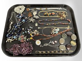 A quantity of costume necklaces and earrings,