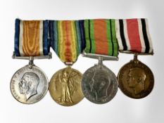 A First and Second World War medal group including a British war medal and victory medal named to