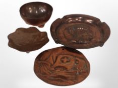 A copper royal commemorative ashtray, diameter 15cm, and three further copper dishes.