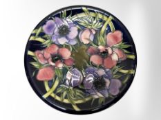 A Moorcroft plate, diameter 26cm.