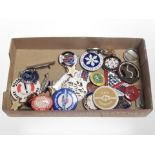 A collection of enameled pin badges including Corgi, Robertsons, Order of the Knights of the Road,