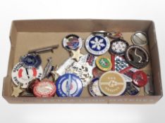 A collection of enameled pin badges including Corgi, Robertsons, Order of the Knights of the Road,