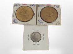 Three Montreal Expo 1967 coins.