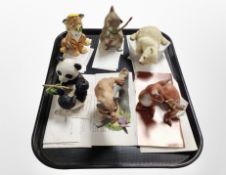 A group of six Eva Dalberg bisque porcelain animal figures with certificates.