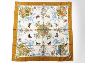 A Gucci silk scarf, 90cm square.