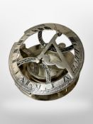 A reproduction sundial/compass, diameter 11cm.