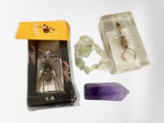 An amethyst tower and moonstone bracelet together with golden scorpion and Giant hornet in resin