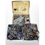 Three boxes of assorted costume jewellery, brooches, bracelets,