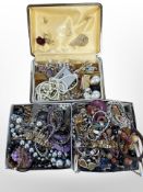 Three boxes of assorted costume jewellery, brooches, bracelets,