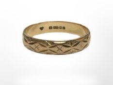 A 9ct gold band ring, size M. CONDITION REPORT: 1.7g.