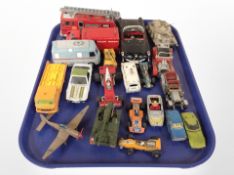 A group of play worn die-cast vehicles,