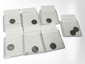 Eight silver 1864 1 Kreuzer coins.