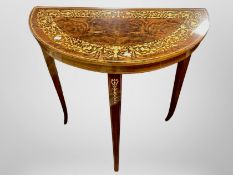 An Italian style inlaid D-shaped hall table,