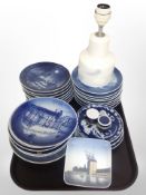 A group of Royal Copenhagen blue and white collector's plates together with a further lamp base and