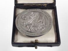 A 1oz silver Dux medal, dated 1965, presented to Ruth Jamieson.