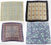 Four Liberty of London silk squares in floral and paisley designs, each 70cm.