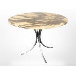 A circular faux marble topped table on chrome support,