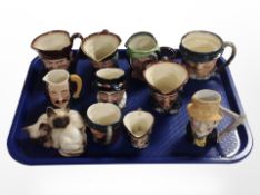 A group of Royal Doulton miniature character jugs, Beswick figure of Siamese cats, etc.