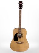 An Encore model LH255 acoustic guitar