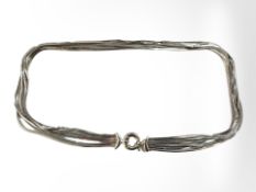 A silver multi-strand herringbone link necklace, length 40cm. CONDITION REPORT: 35.