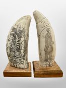 Two decorative scrimshaw-style resin carvings, height 17.5cm.