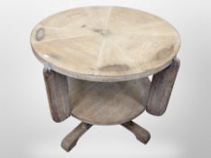 An Art Deco bleached oak circular two tier occasional table,