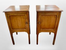 A pair of early 20th century mahogany bedside cabinets,