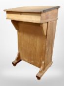 A late Victorian pine clerk's desk,