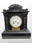 An Edwardian slate eight day mantel clock with presentation inscription dated 1908,