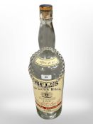 A large Bell's Old Scotch Whisky Bottle, height 52cm, together with a large belcher link necklace.