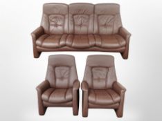 A contemporary stitched brown leather three piece suite