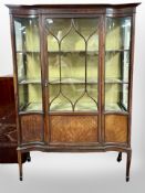 A Victorian mahogany and satin wood strung display cabinet,